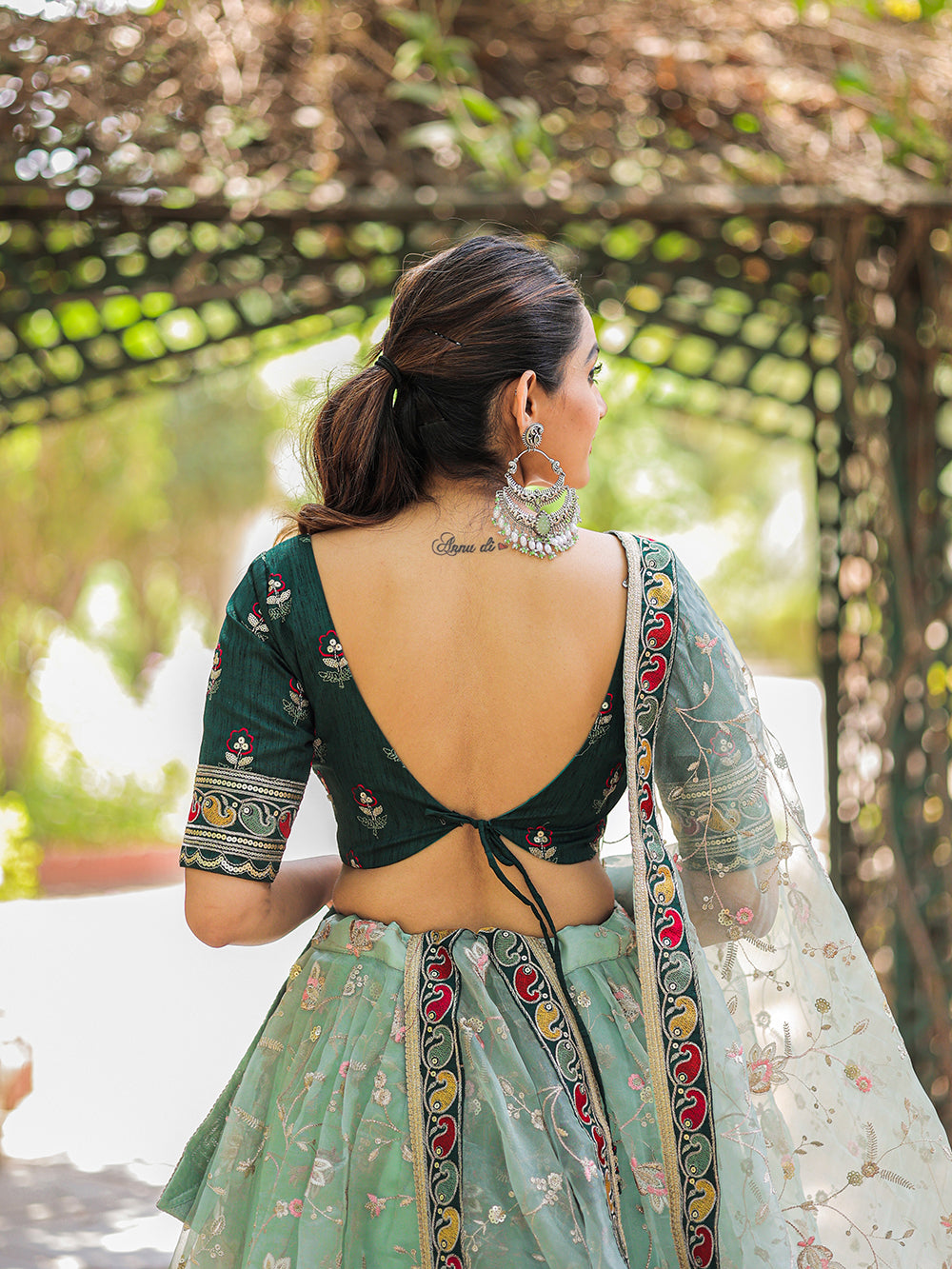 Pista Color Thread Embroidery Work With Lace Border Organza Lehenga Choli