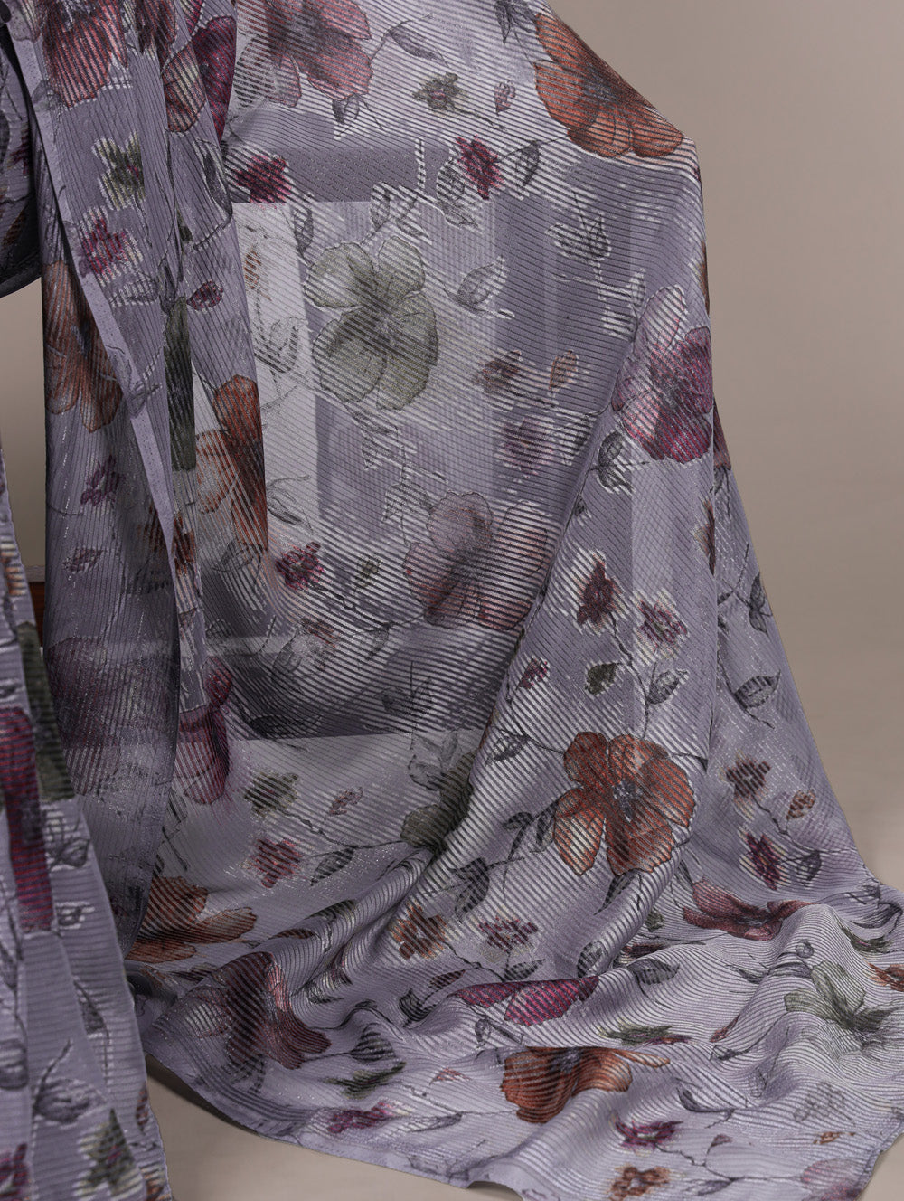 Grey floral lurex brasso saree with natural silk blouse