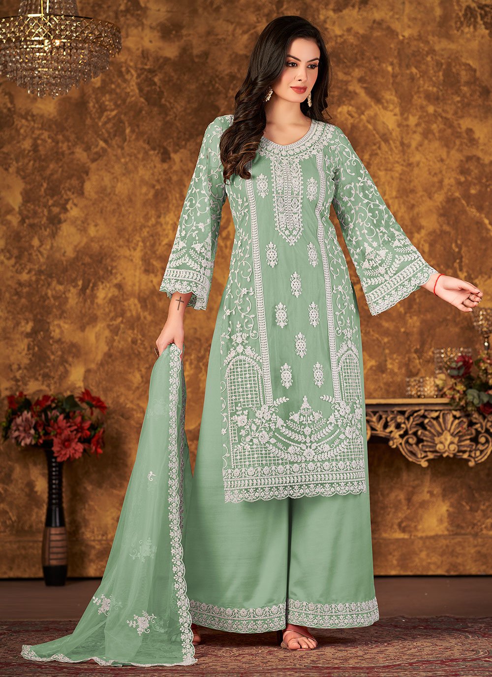 Trendy green net embroidered palazzo style suit for women