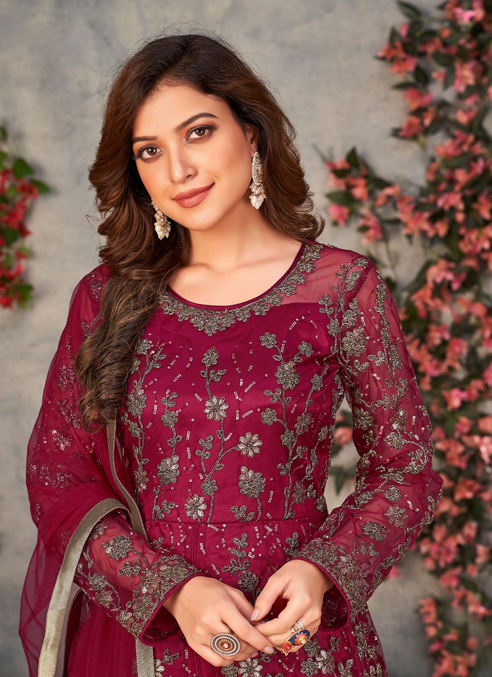 Trendy maroon embroidered slit style anarkali suit in net