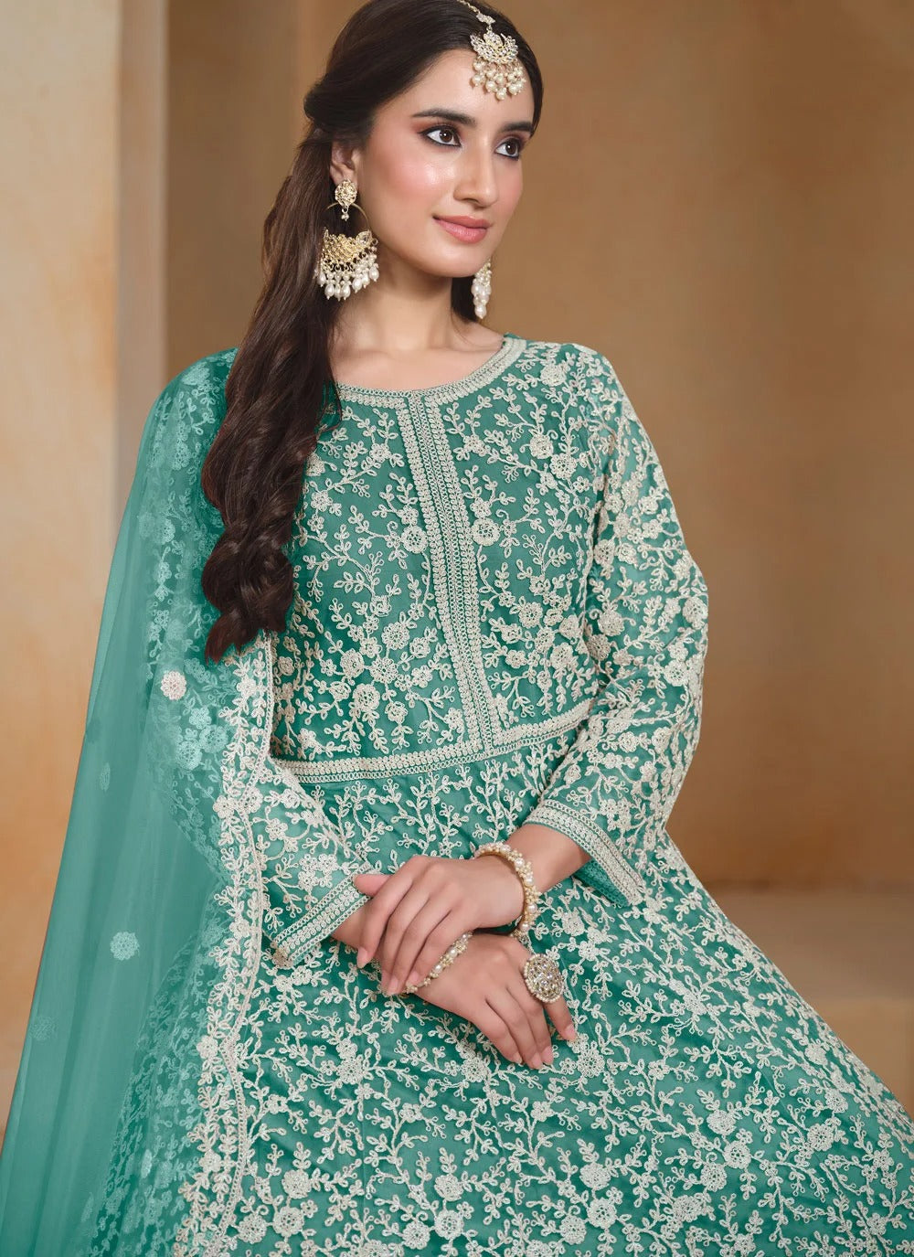 Designer anarkali suit in turquoise with thread embroidery