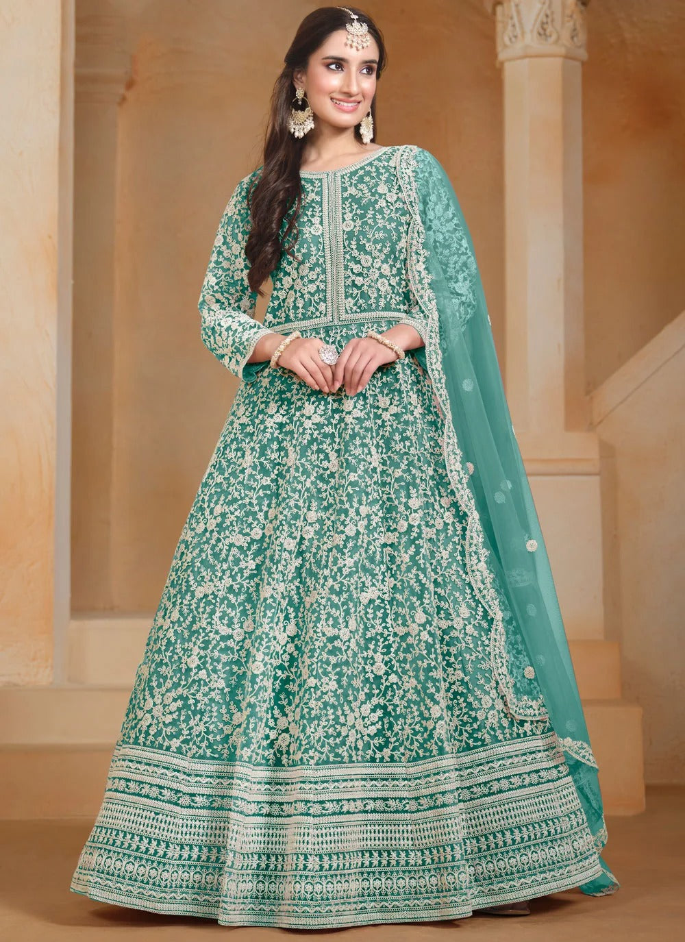 Designer anarkali suit in turquoise with thread embroidery