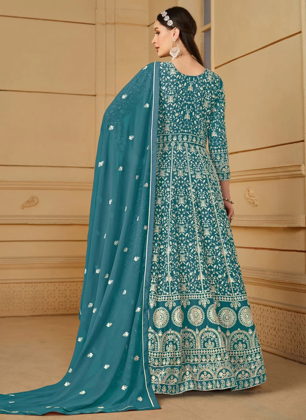 Flowy turquoise faux georgette embroidered anarkali suit