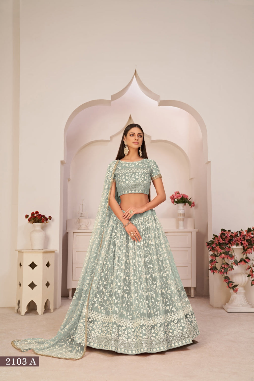 Turquolse Green Elegant Butterfly Net Lehenga with Intricate Embroidery
