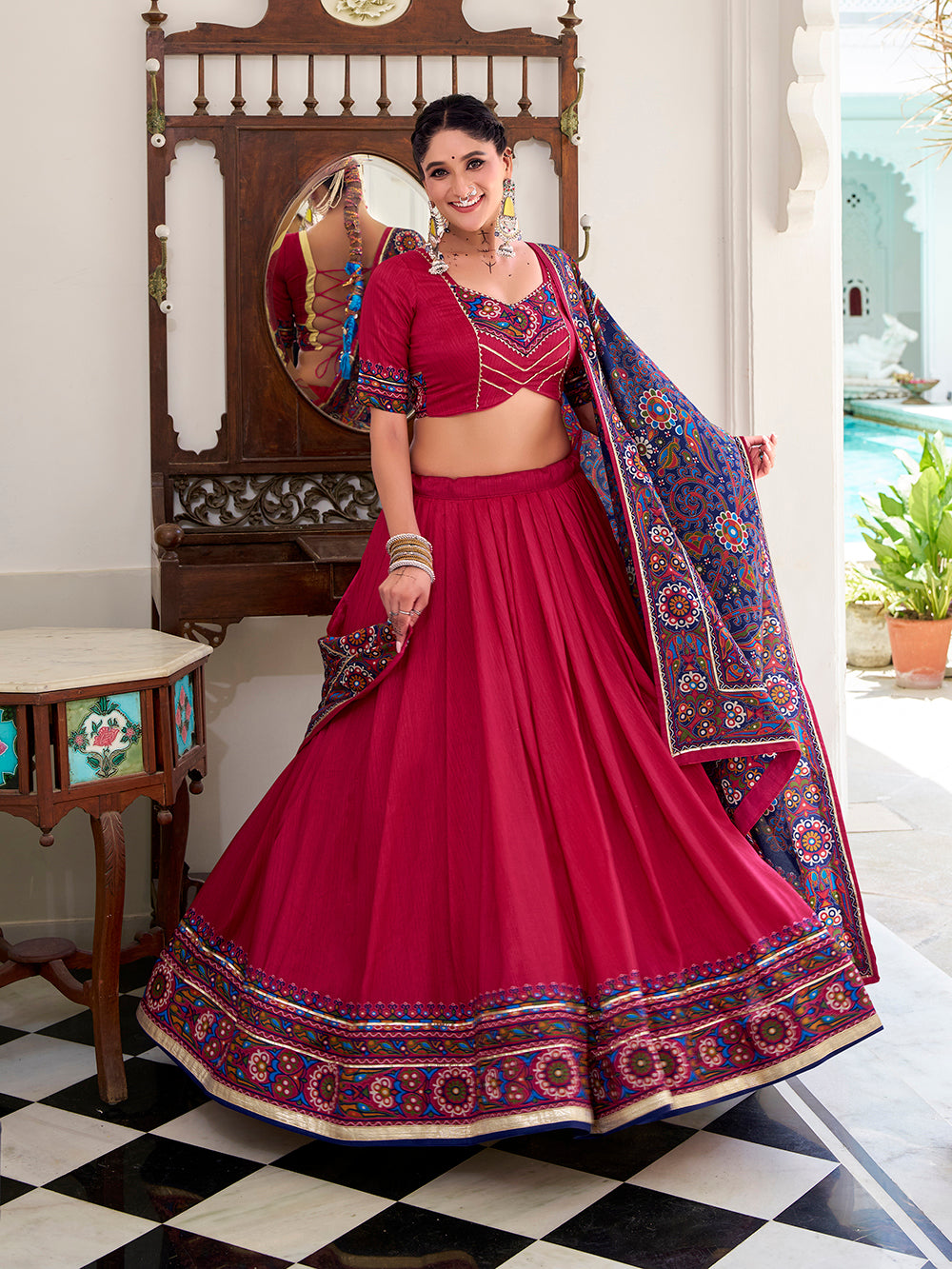 Pink tasar silk gamthi print lehenga choli with embossed design gotta patti work
