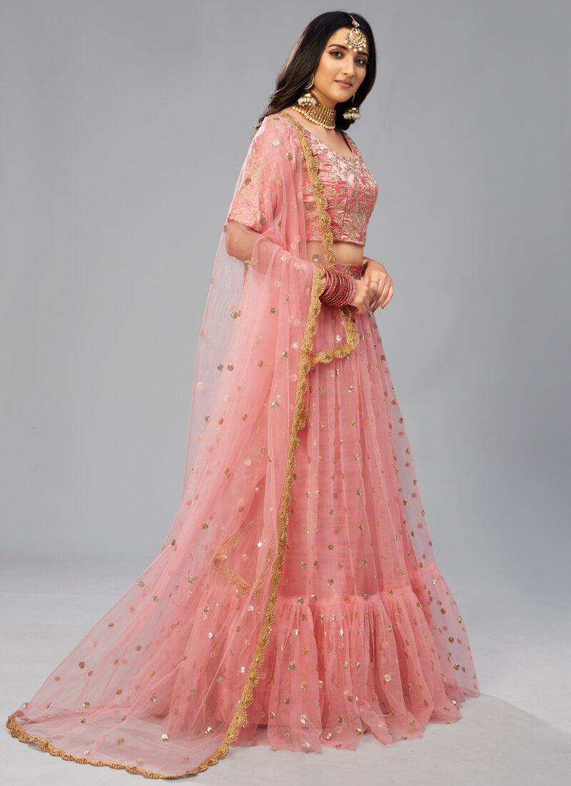 Unbeatable Peach Pink Soft Net Flared Sangeet Wear Lehenga Choli