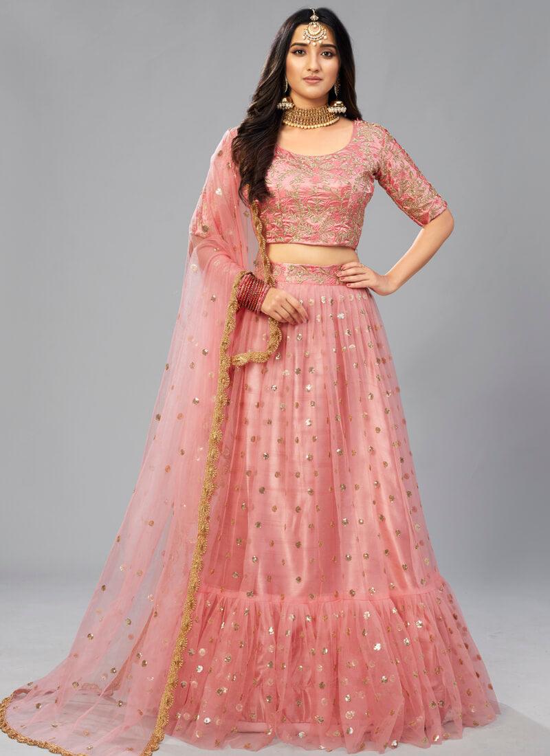 Unbeatable Peach Pink Soft Net Flared Sangeet Wear Lehenga Choli