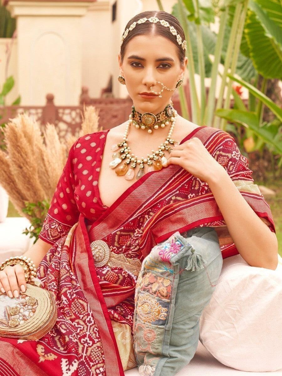 Unbelievable Cream Patola Printed Silk Reception Wear Saree