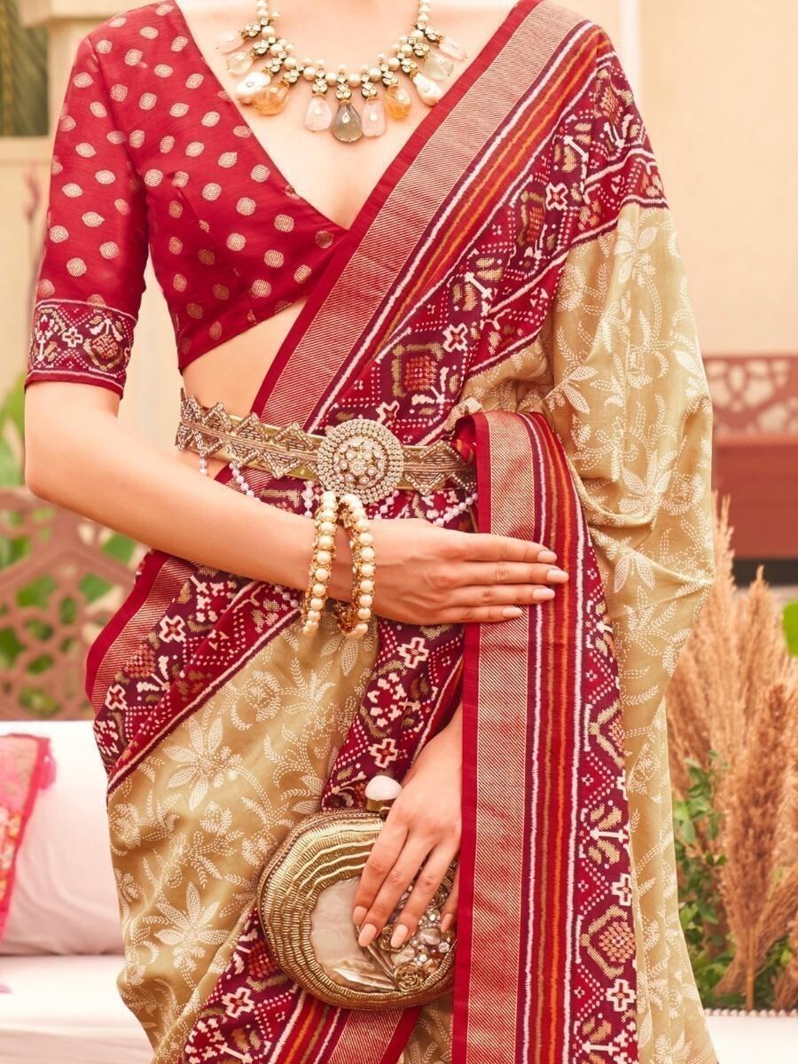 Unbelievable Cream Patola Printed Silk Reception Wear Saree