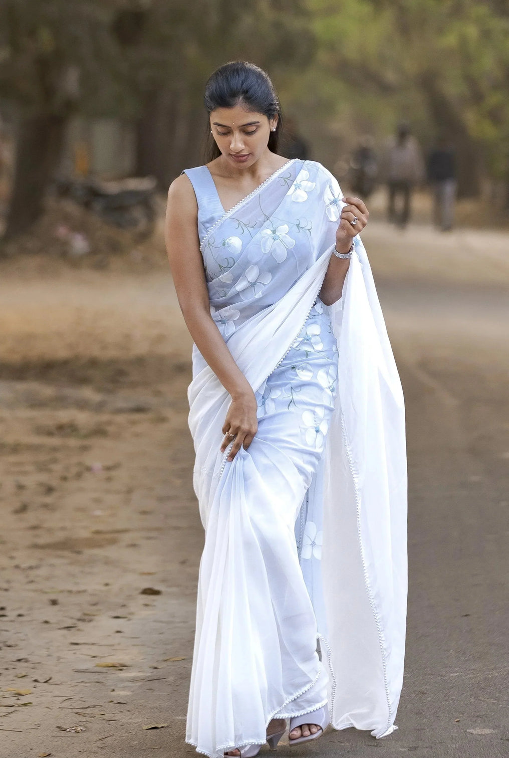 Sky Blue Pure Georgette Hand-Painted Saree with White Floral Motifs and Sequins | Modal Satin Blouse