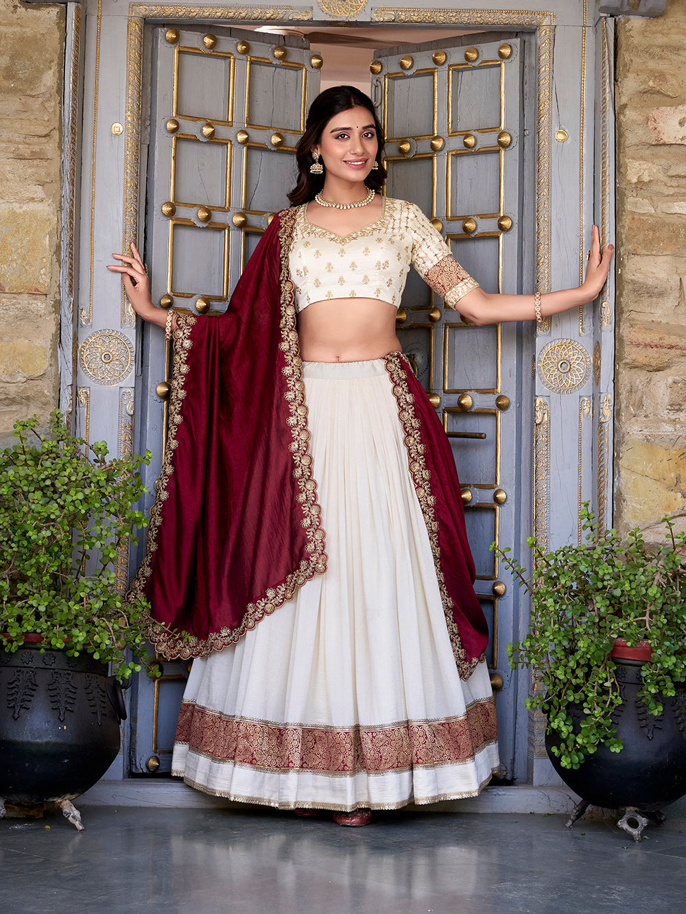 Off white vichitra silk zari weaving lehenga choli with sequin belt dupatta