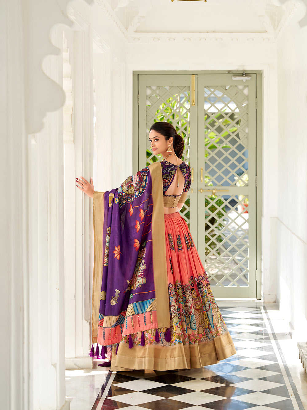 Peach dola silk kalamkari print lehenga with purple dupatta unstitched blouse