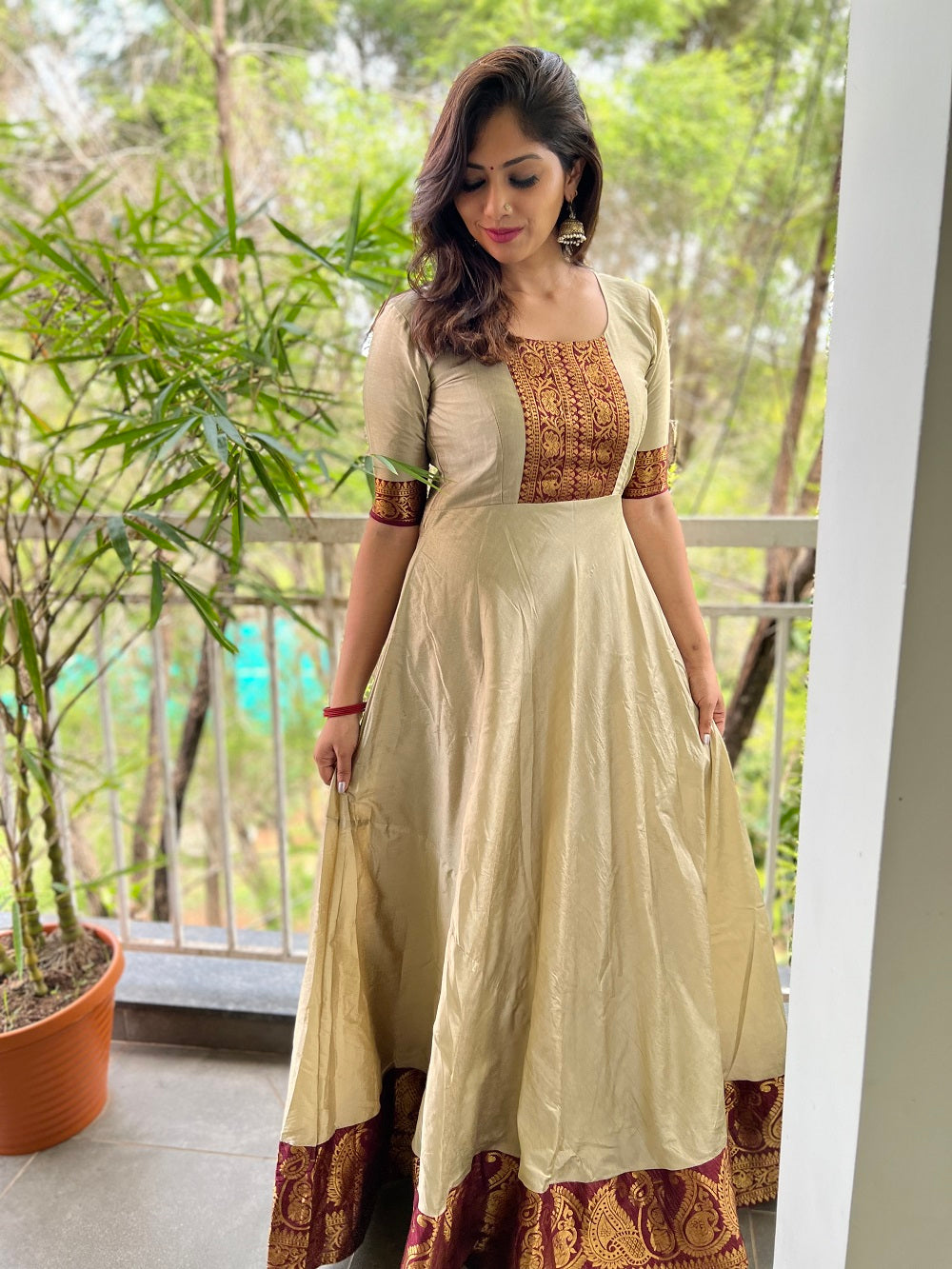 Chiku Color Weaving Zari Work Silk Gown