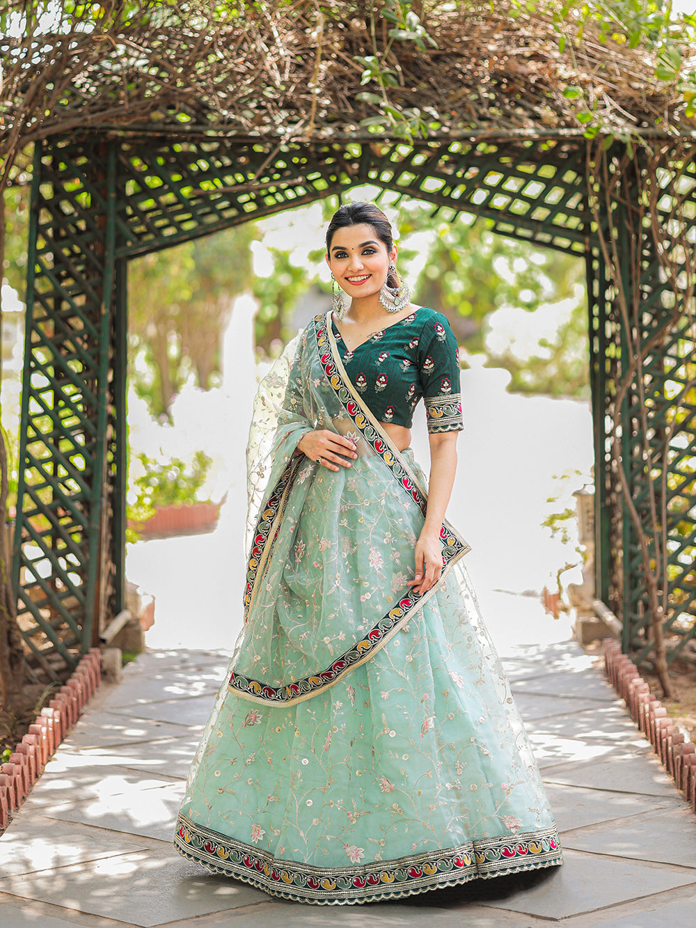 Pista Color Thread Embroidery Work With Lace Border Organza Lehenga Choli