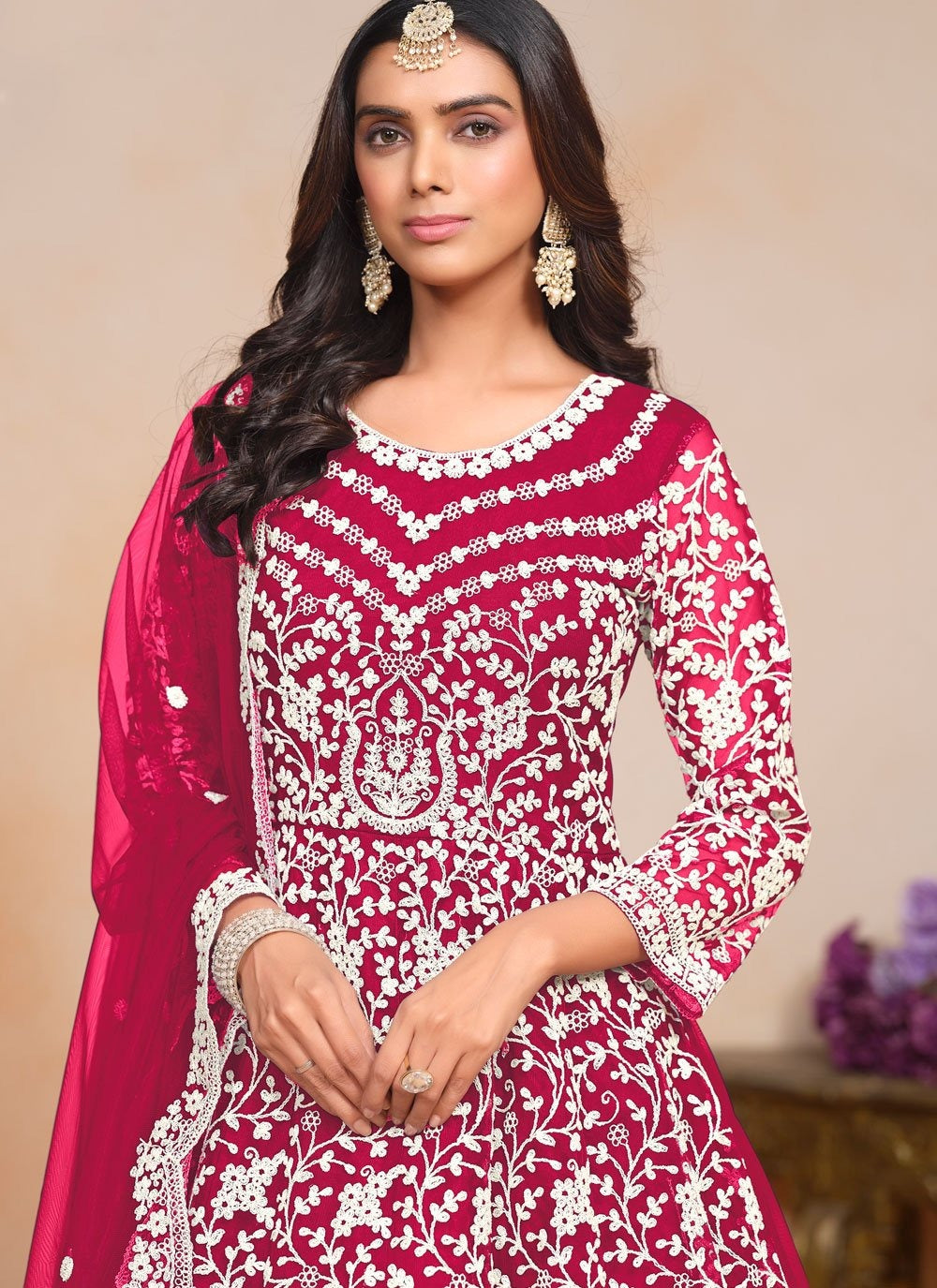 Radiant rani pink anarkali suit in net with embroidered dupatta