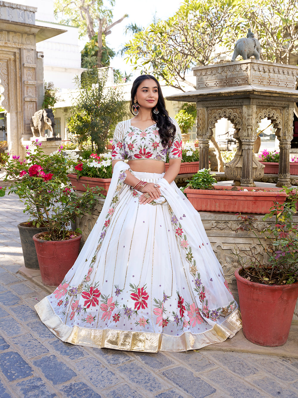 Elegant white georgette wedding lehenga choli with sequins thread embroidery