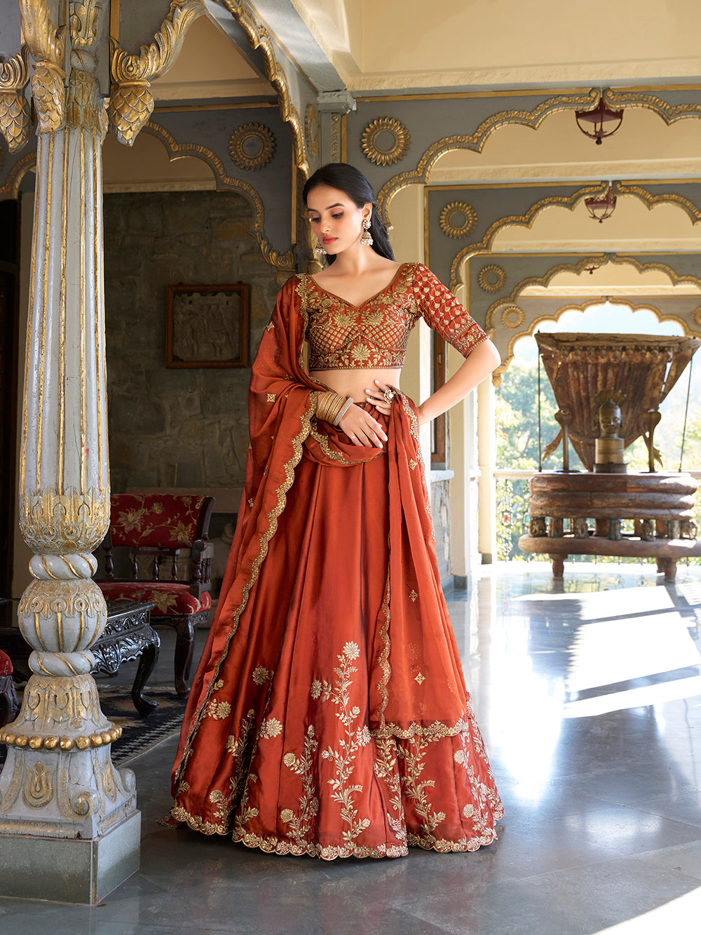 Rust orange color sequins and thread embroidery work rangoli silk lehenga choli