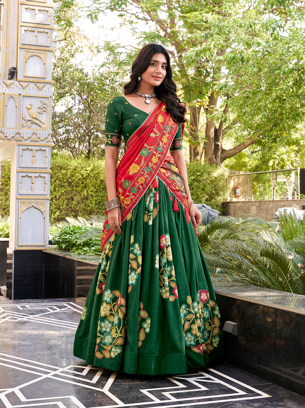 Emerald green tussar silk lehenga choli with foil print lace accents matching dupatta