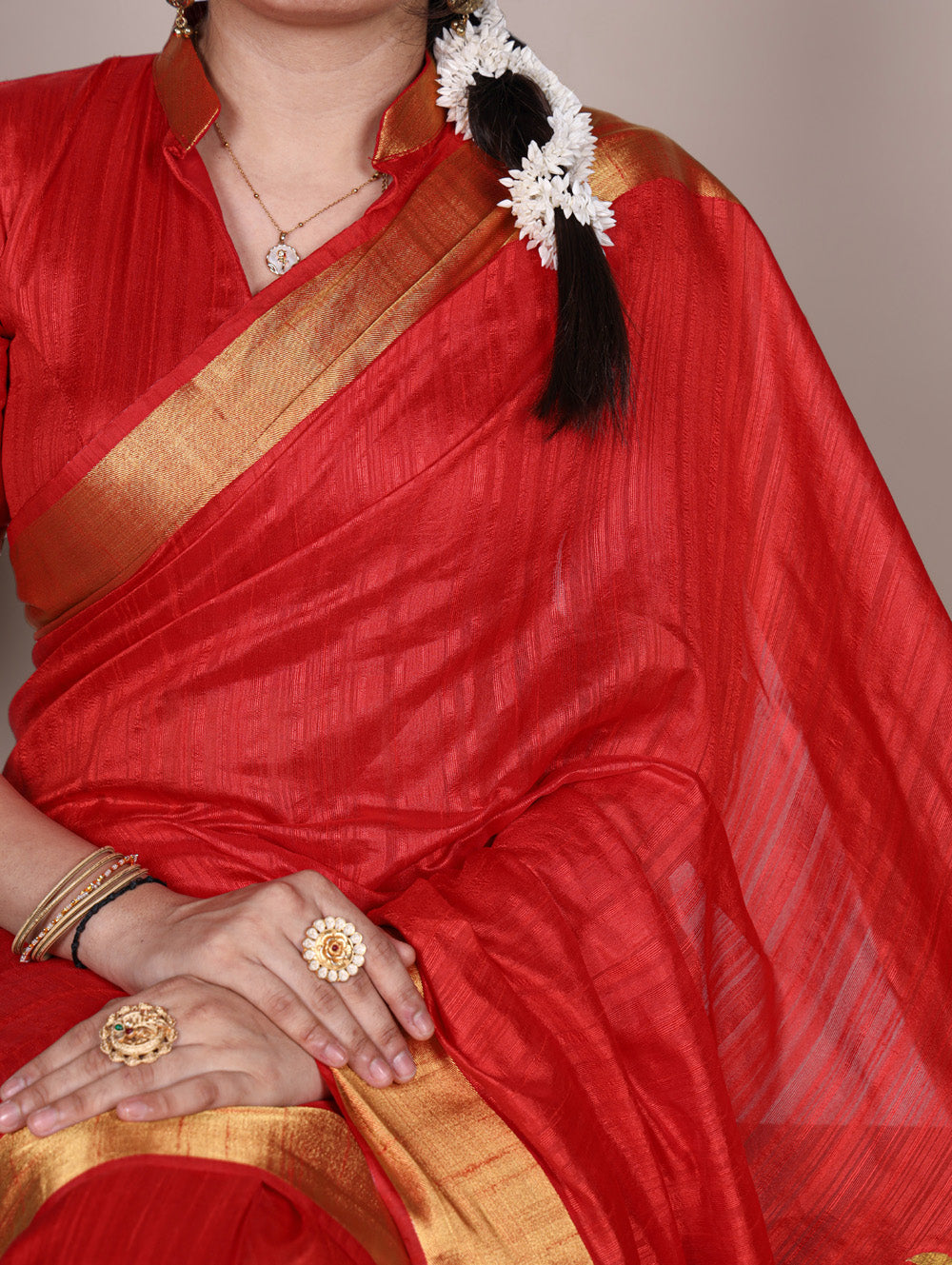 Red raw silk saree with zari weaving work unstitched blouse