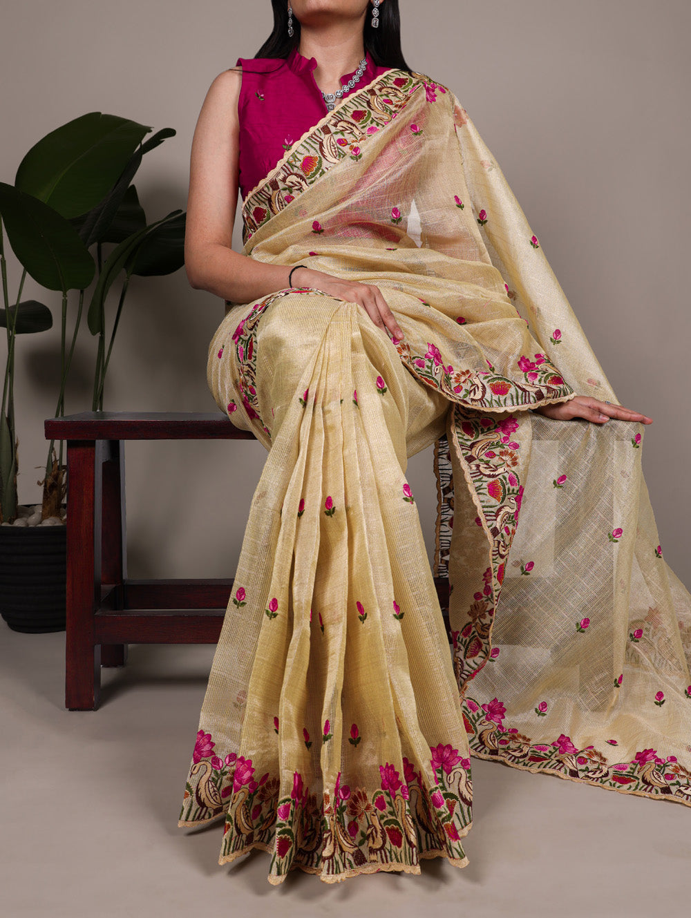 Gold zari kota tissue saree with floral thread embroidery and banglory blouse fabric