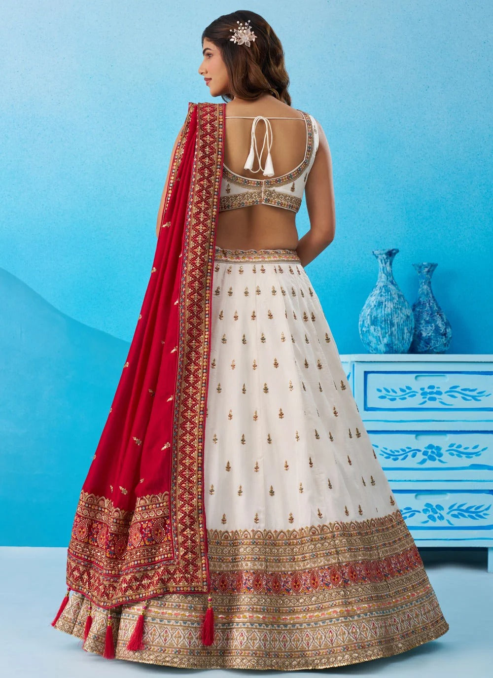 White chinnon silk wedding lehenga with zari sequins embroidery