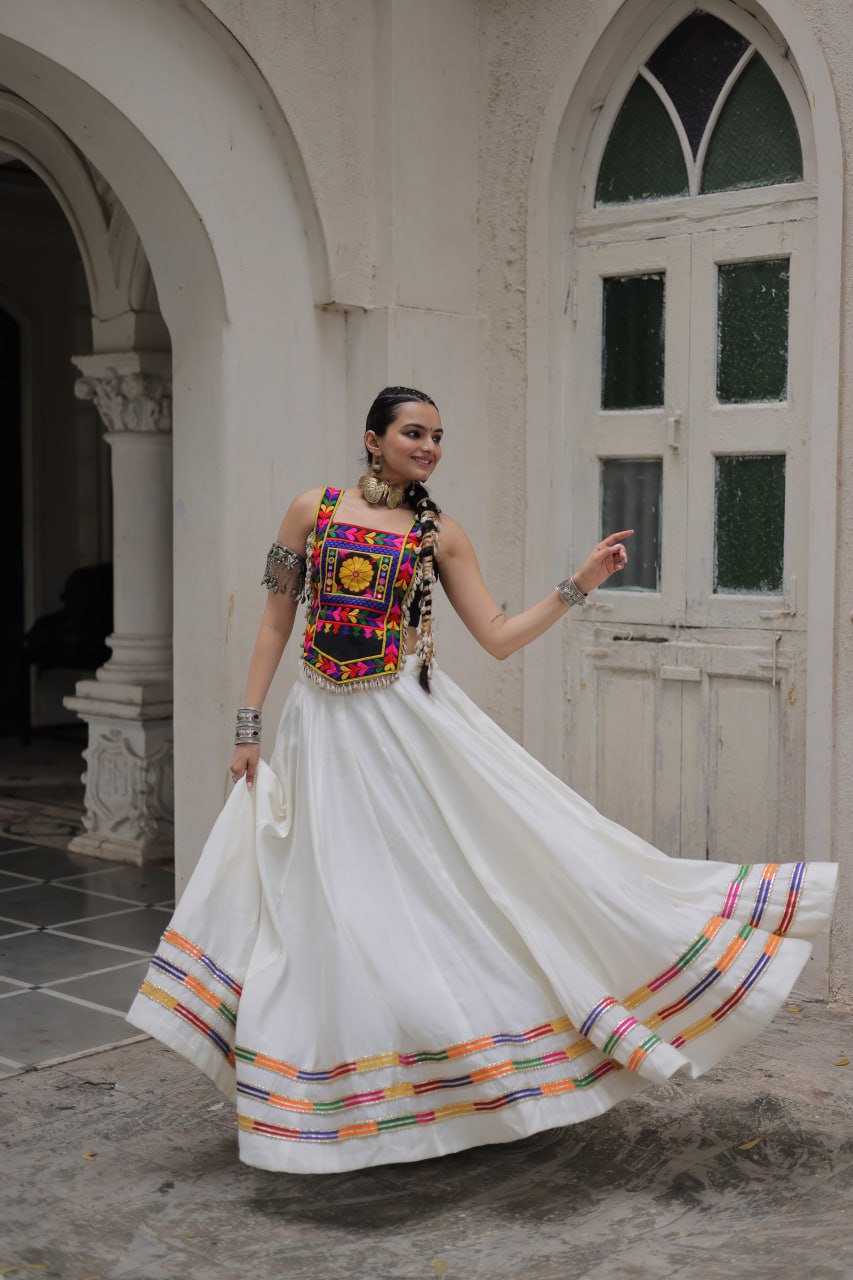 White Festive Roman Fabric Lehenga with black Kutchi Gamthi Embroidered Top