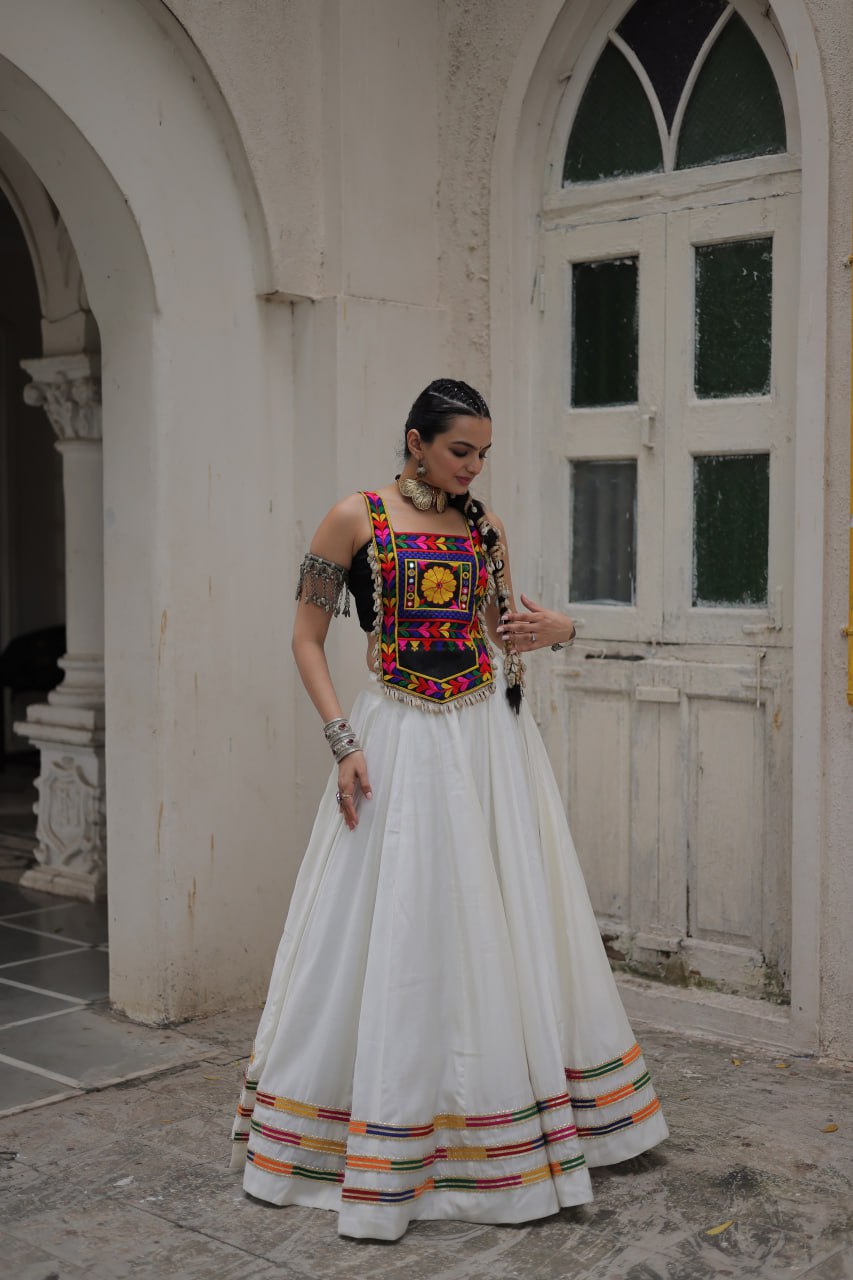 White Festive Roman Fabric Lehenga with black Kutchi Gamthi Embroidered Top