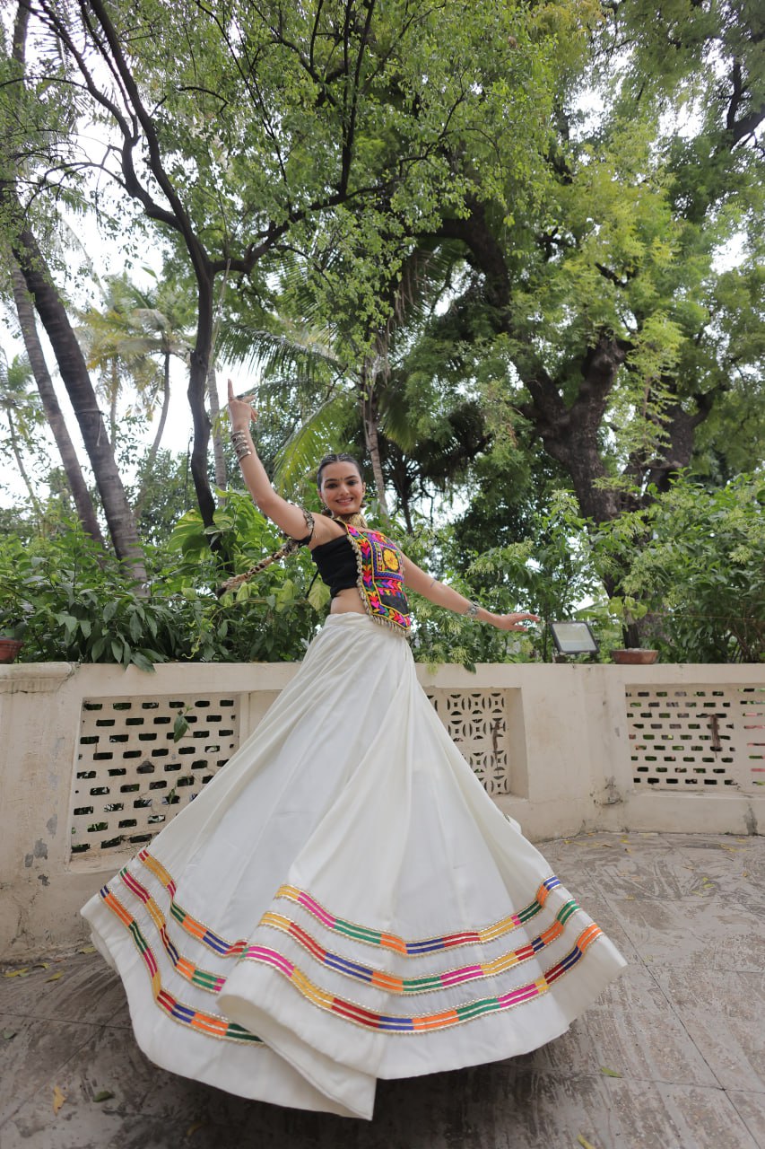 White Festive Roman Fabric Lehenga with black Kutchi Gamthi Embroidered Top