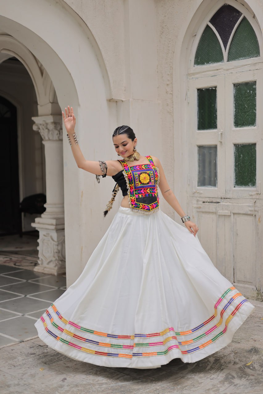 White Festive Roman Fabric Lehenga with black Kutchi Gamthi Embroidered Top