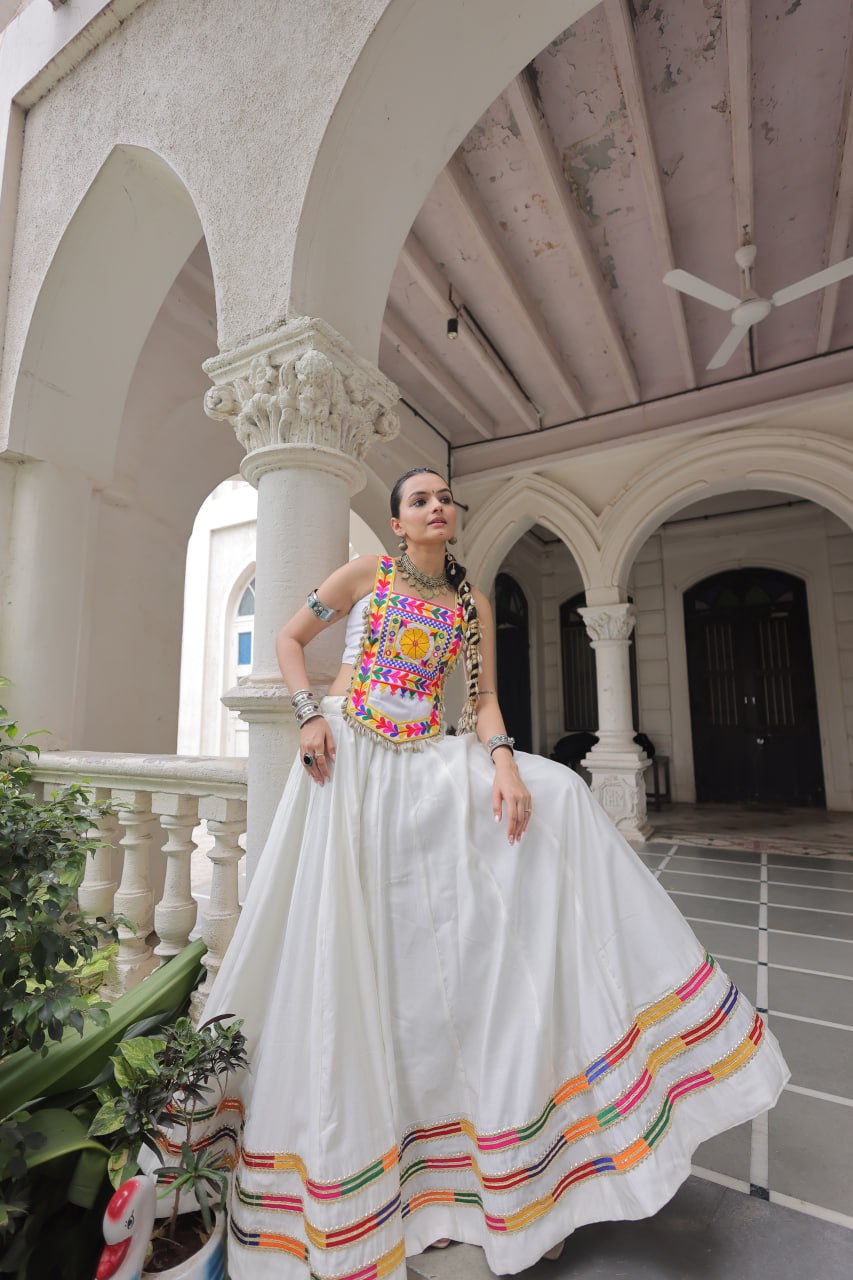 White Festive Roman Fabric Lehenga with Kutchi Gamthi Embroidered Top