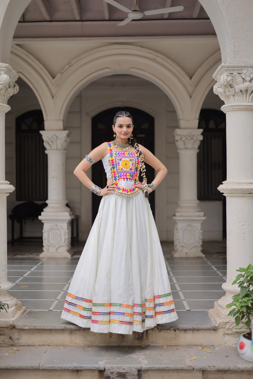 White Festive Roman Fabric Lehenga with Kutchi Gamthi Embroidered Top
