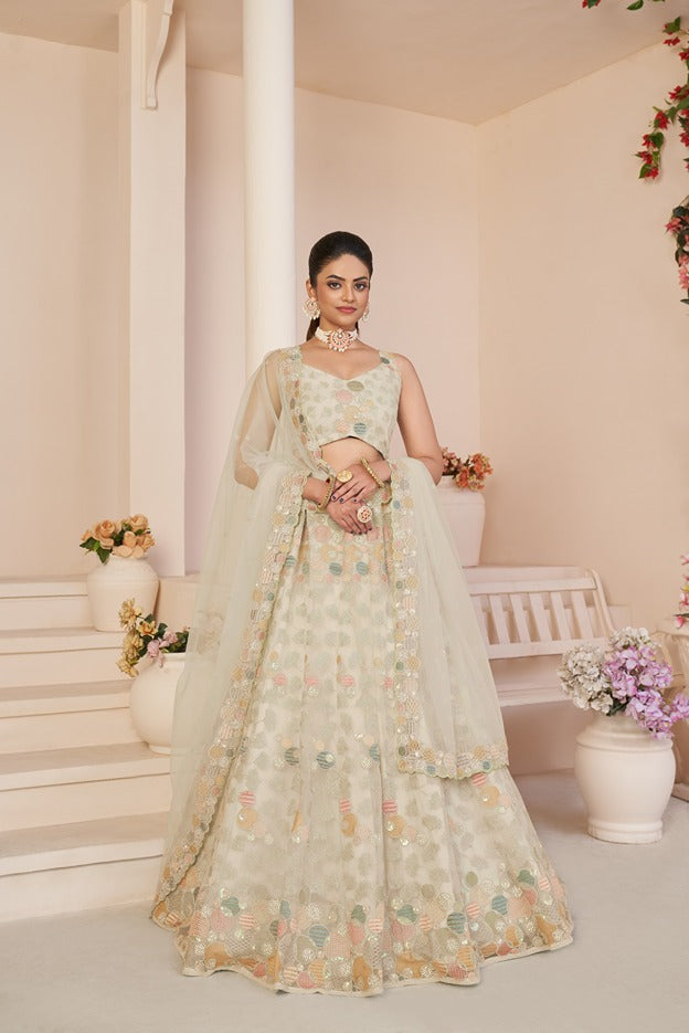 Mesmerizing White Net Lehenga Choli with Multicolor Thread & Sequin Embroidery