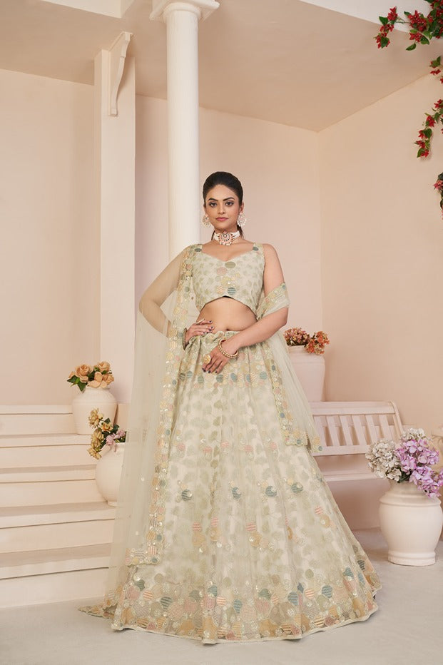 Mesmerizing White Net Lehenga Choli with Multicolor Thread & Sequin Embroidery