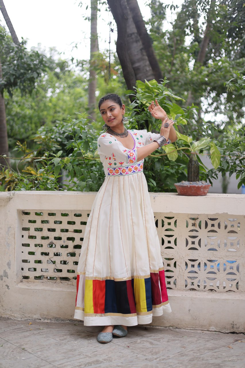 White Premium Roman Fabric Gown with Multicolour Thread & Gota Lace Embellishments