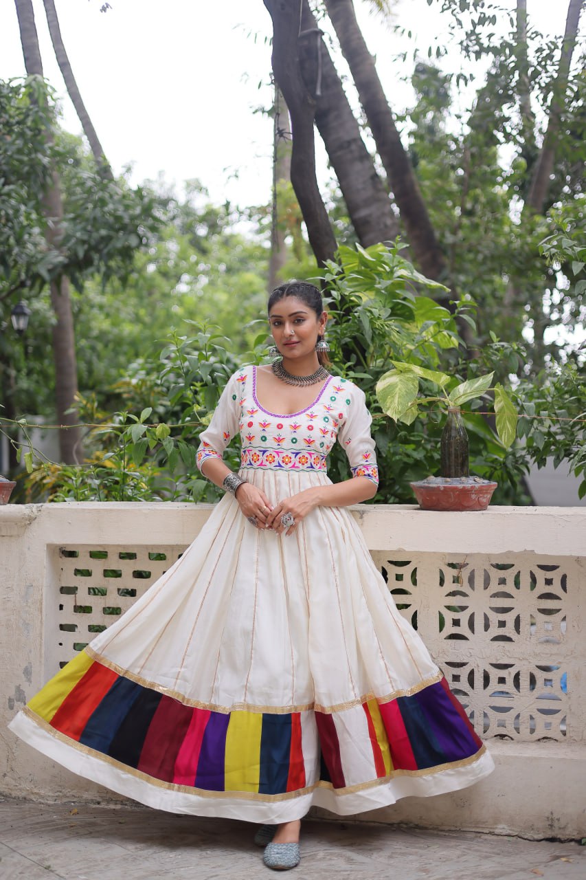 White Premium Roman Fabric Gown with Multicolour Thread & Gota Lace Embellishments