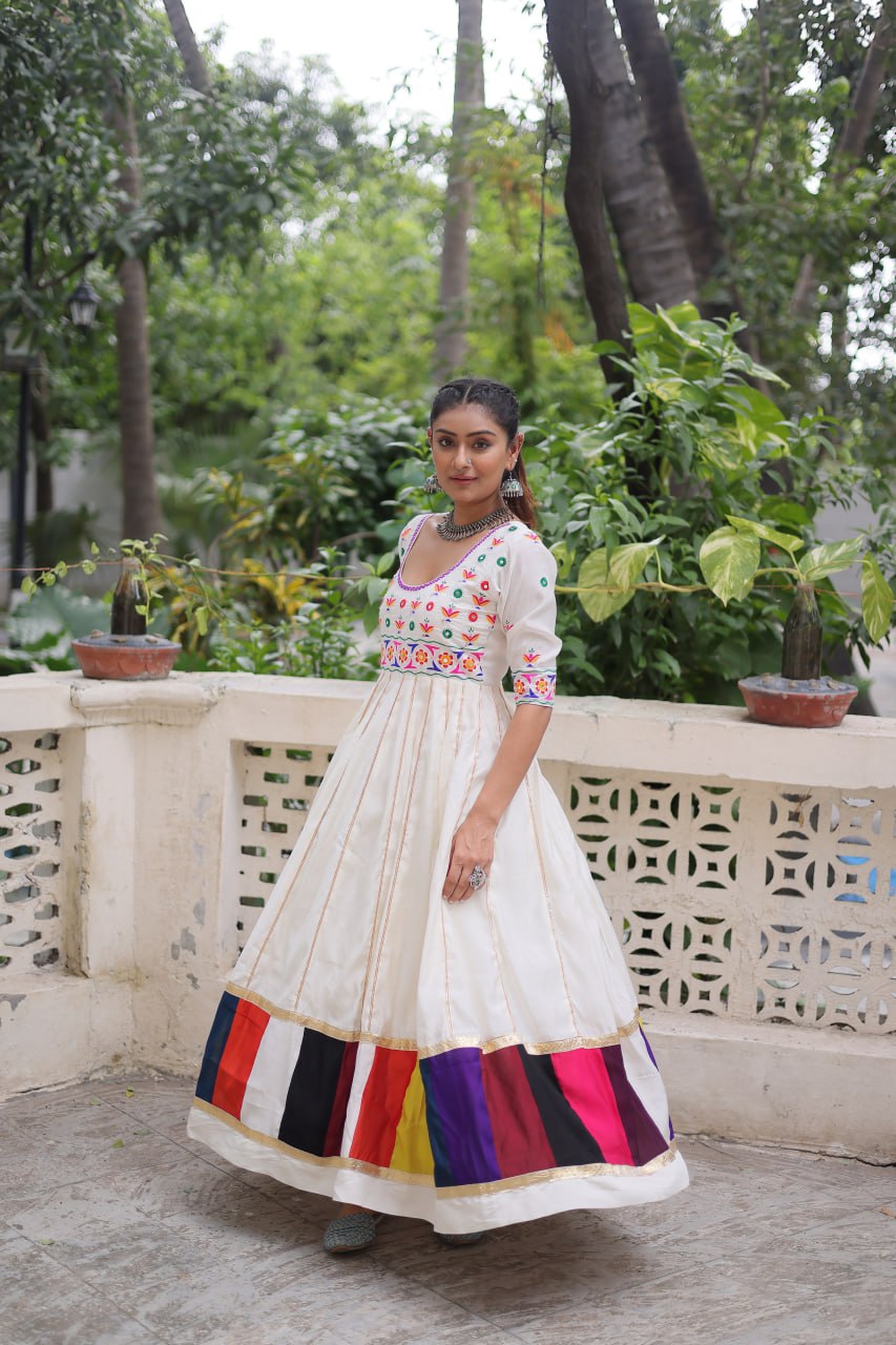 White Premium Roman Fabric Gown with Multicolour Thread & Gota Lace Embellishments
