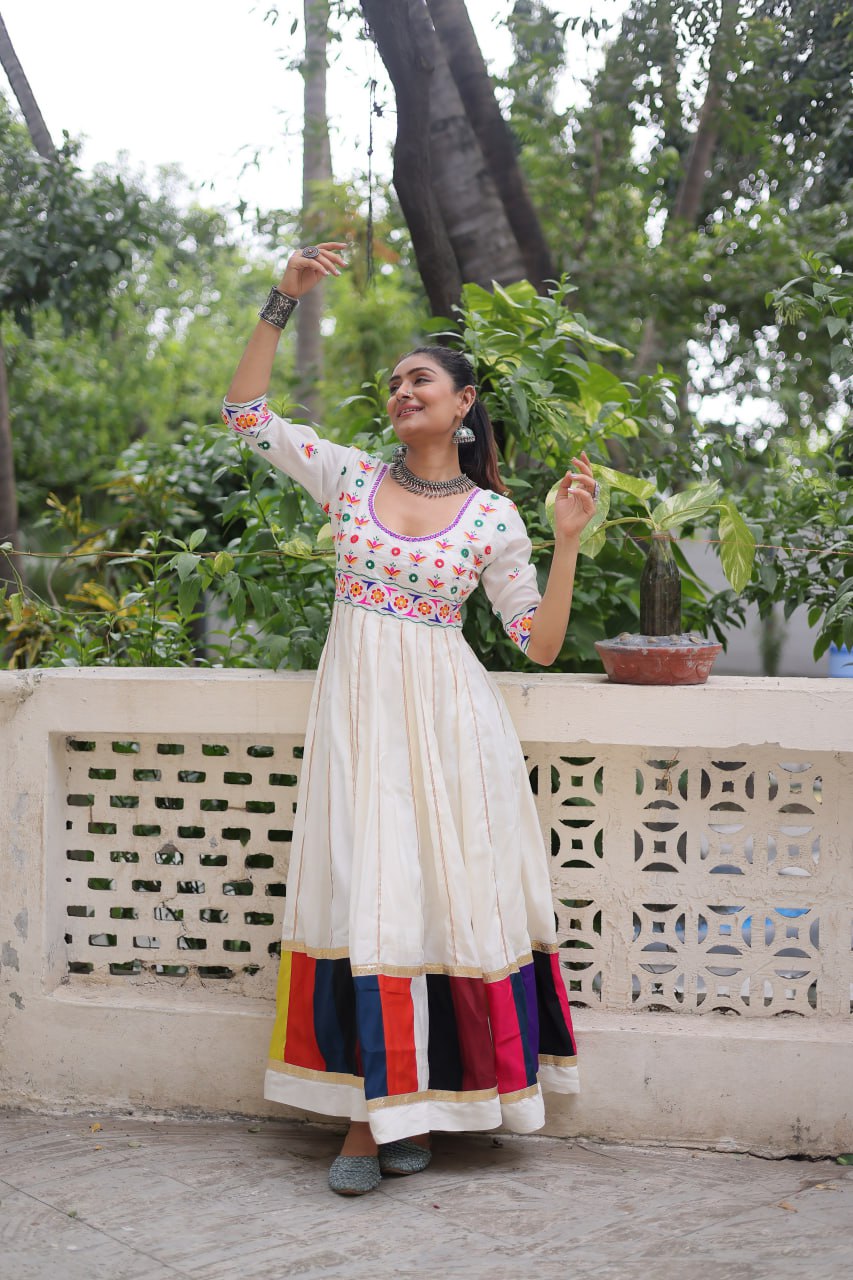 White Premium Roman Fabric Gown with Multicolour Thread & Gota Lace Embellishments