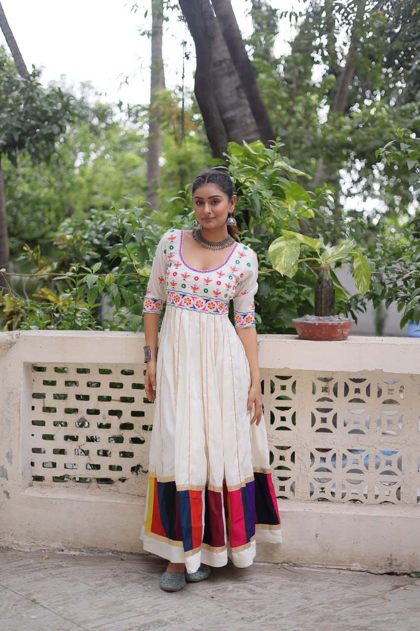 White Premium Roman Fabric Gown with Multicolour Thread & Gota Lace Embellishments