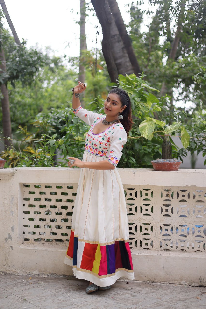 White Premium Roman Fabric Gown with Multicolour Thread & Gota Lace Embellishments
