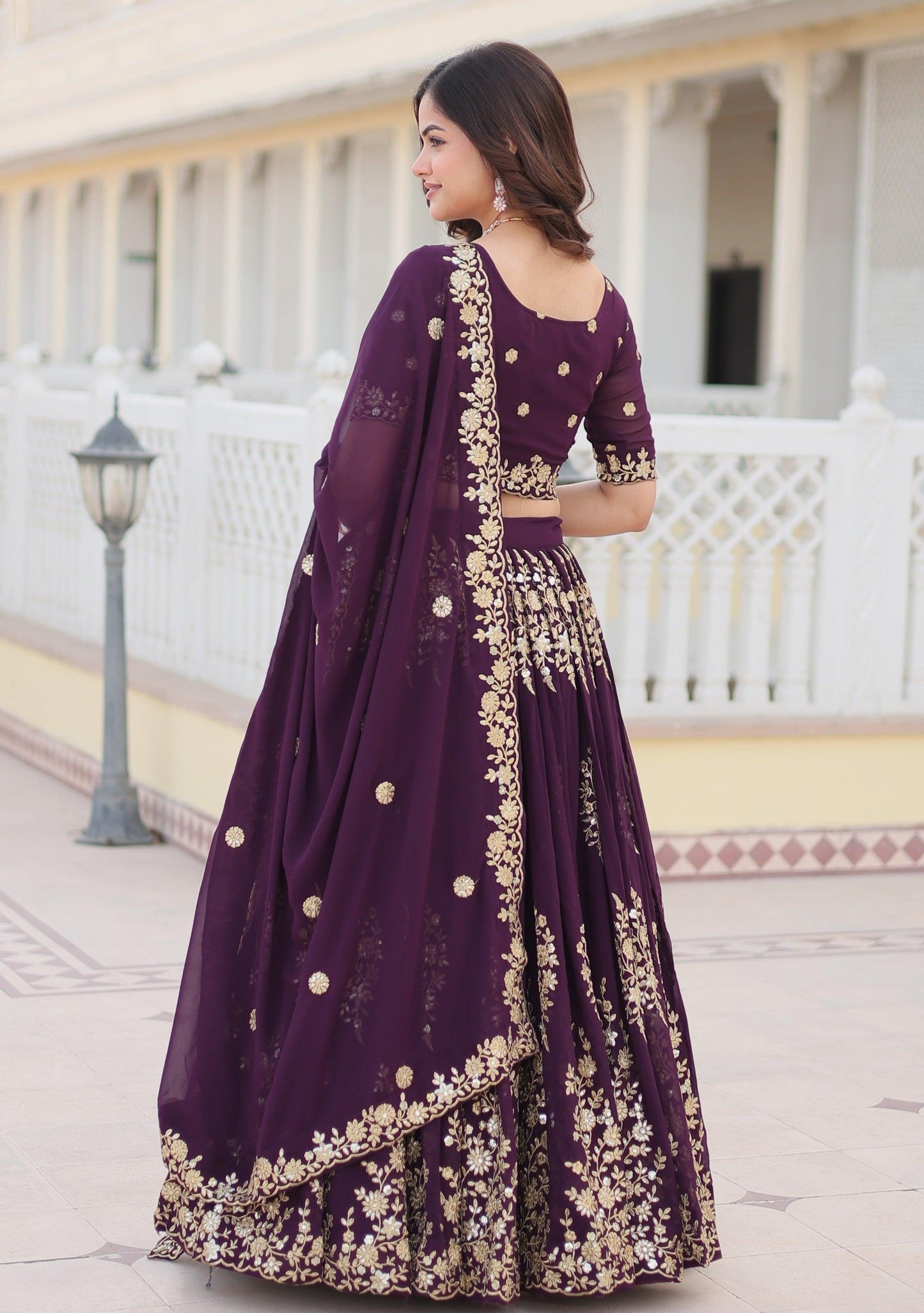 Wine Lehenga Choli with Intricate Embroidery