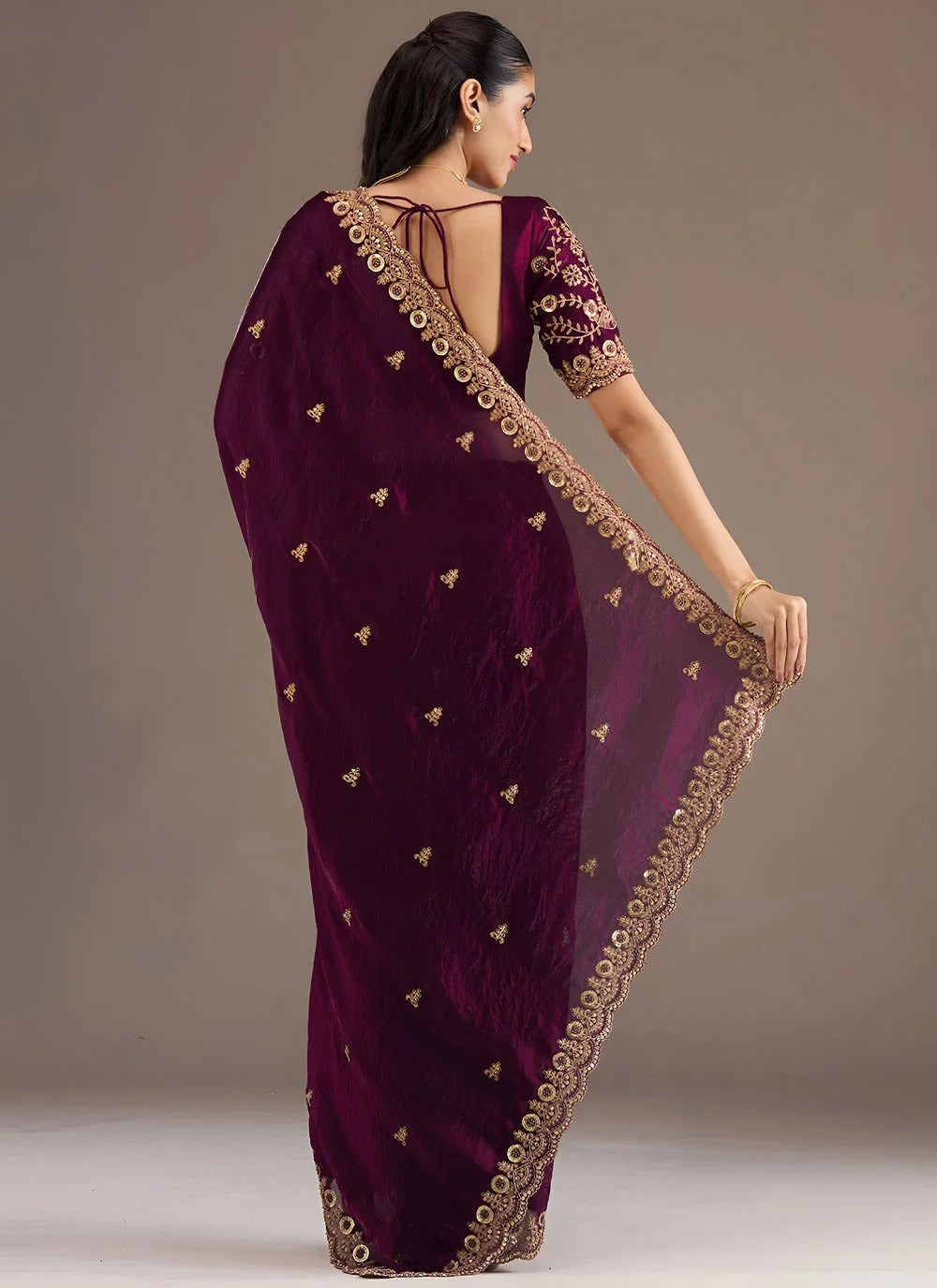 Wine wedding reception tissue saree with zari embroidery