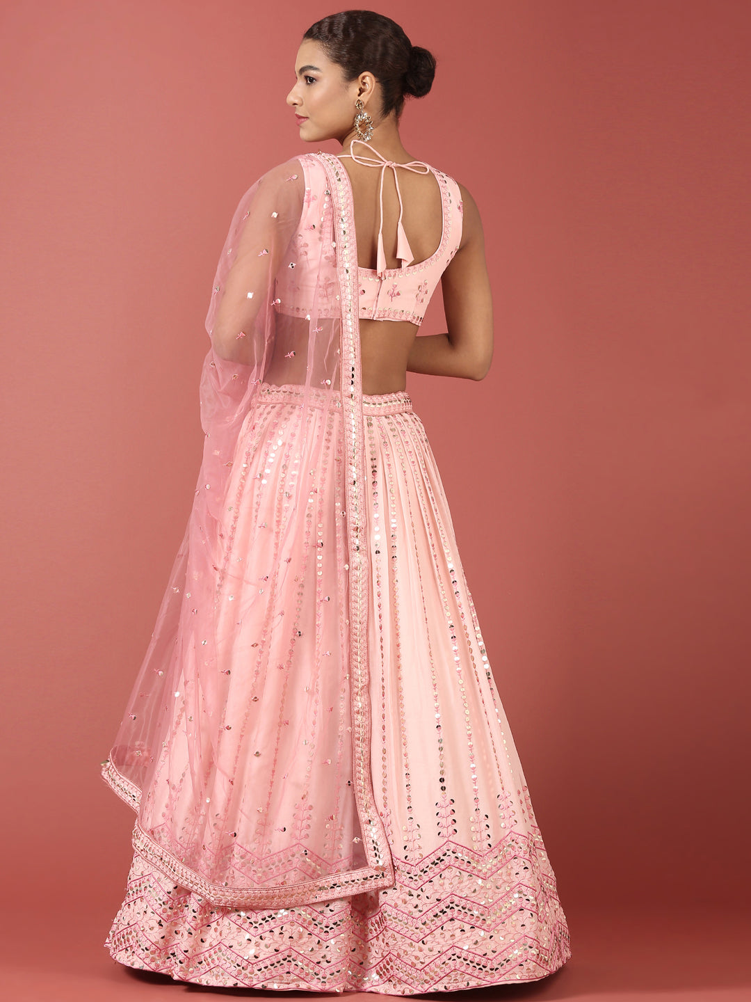 Women Peach Net Sequinse Embroidered Semi-Stitched Lehenga & Blouse with Dupatta
