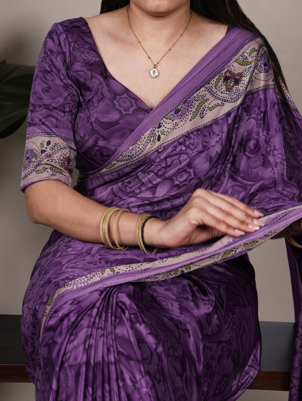 Purple crepe saree with all over print matching blouse
