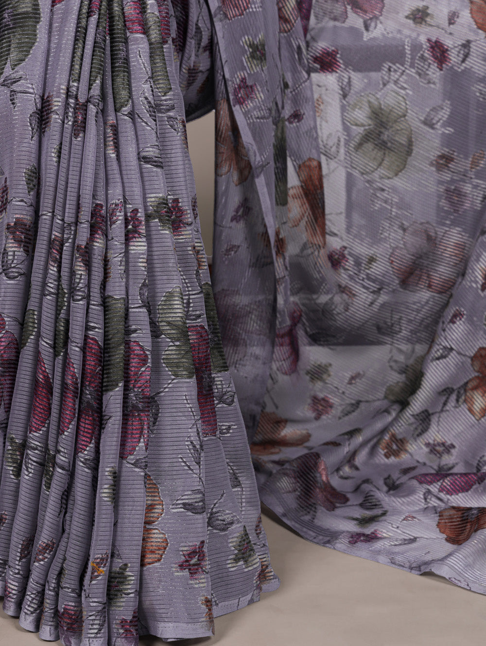 Grey floral lurex brasso saree with natural silk blouse