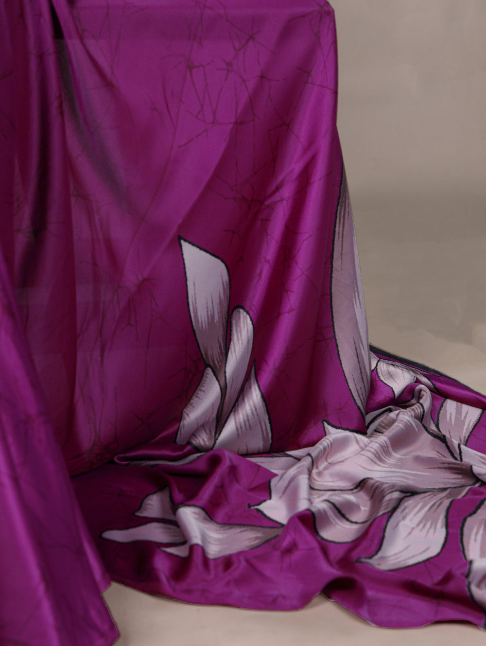 Pink satin silk saree with floral print lavender blouse