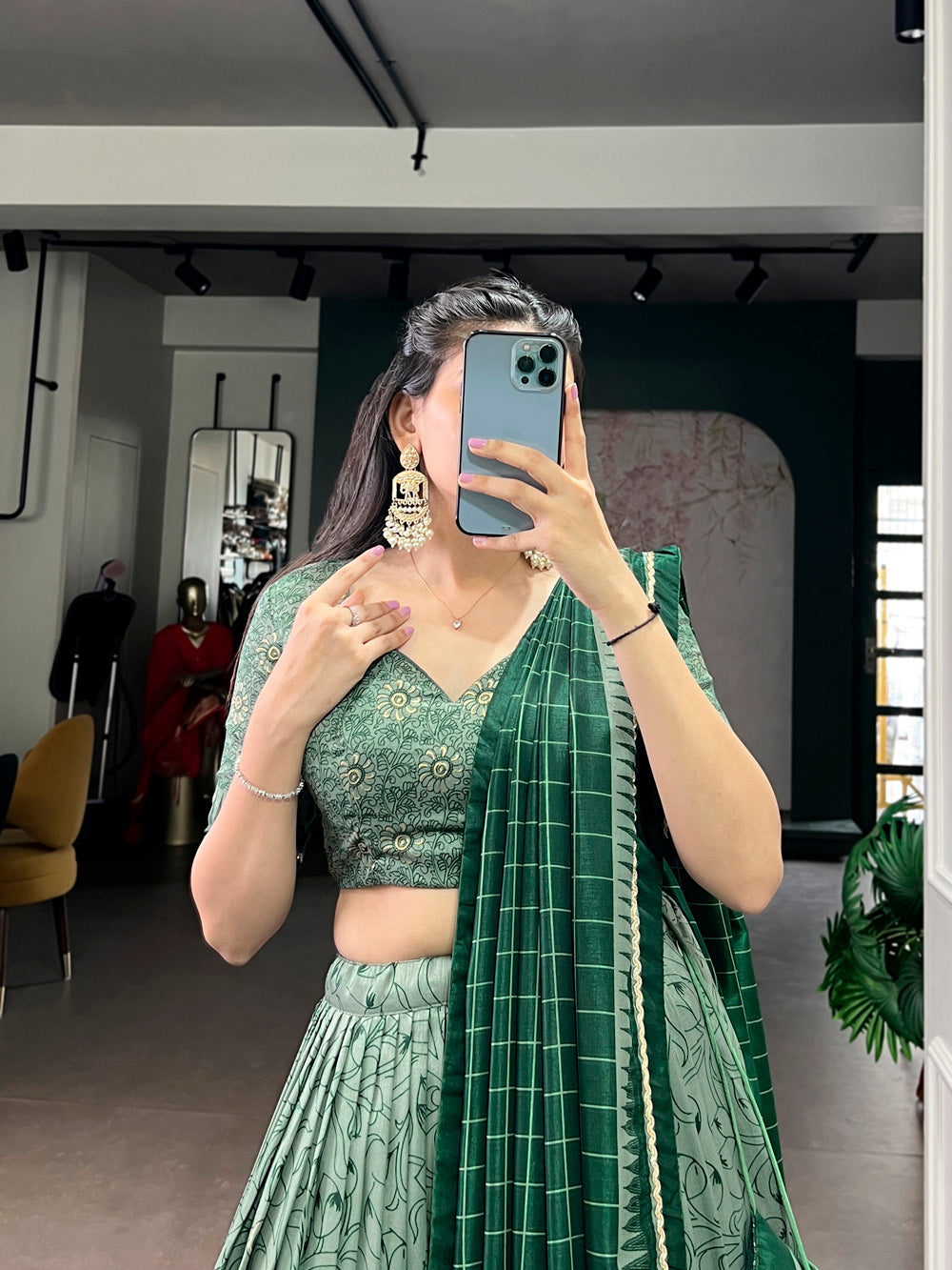 Green tasar silk kalamkari print lehenga choli with lace border tassel dupatta