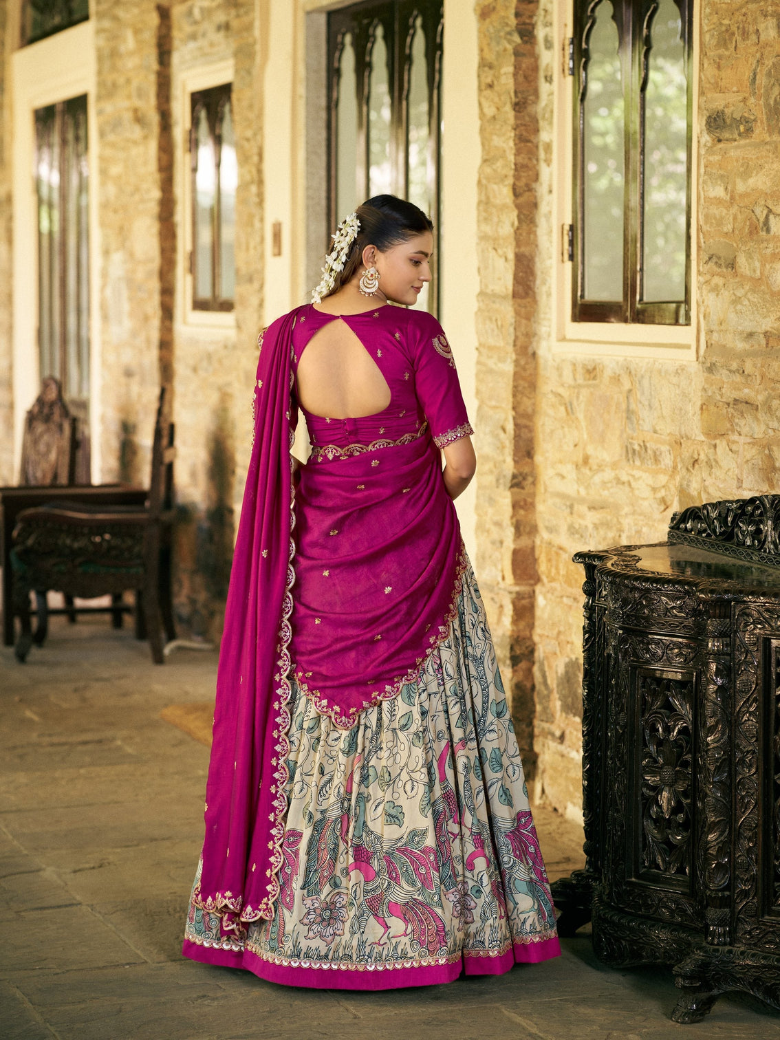 Embroidery work with kalamkari print lehenga choli