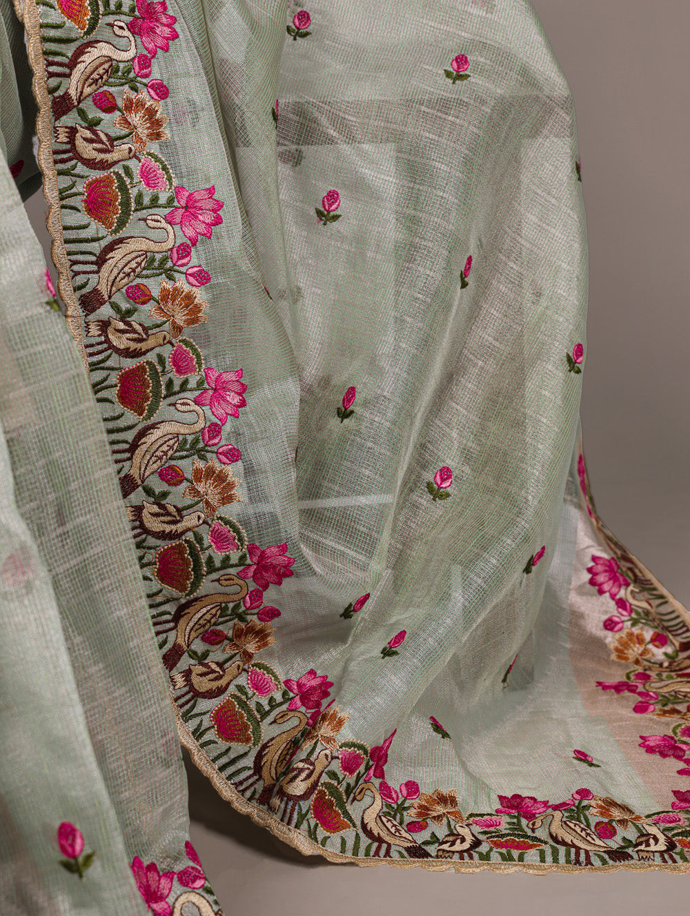 Sea green zari kota tissue saree with floral thread embroidery and banglory blouse fabric