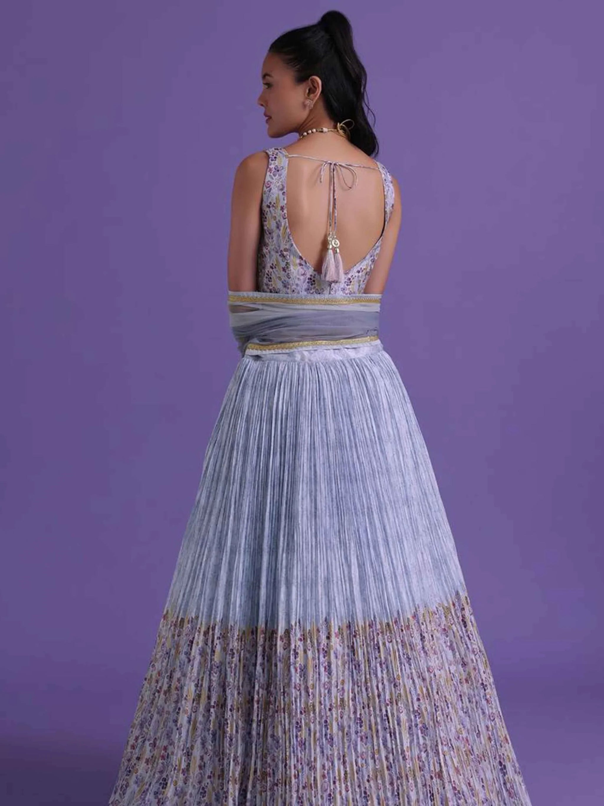 Wonderful Lavender Sequins Net Engagement Wear Lehenga Choli