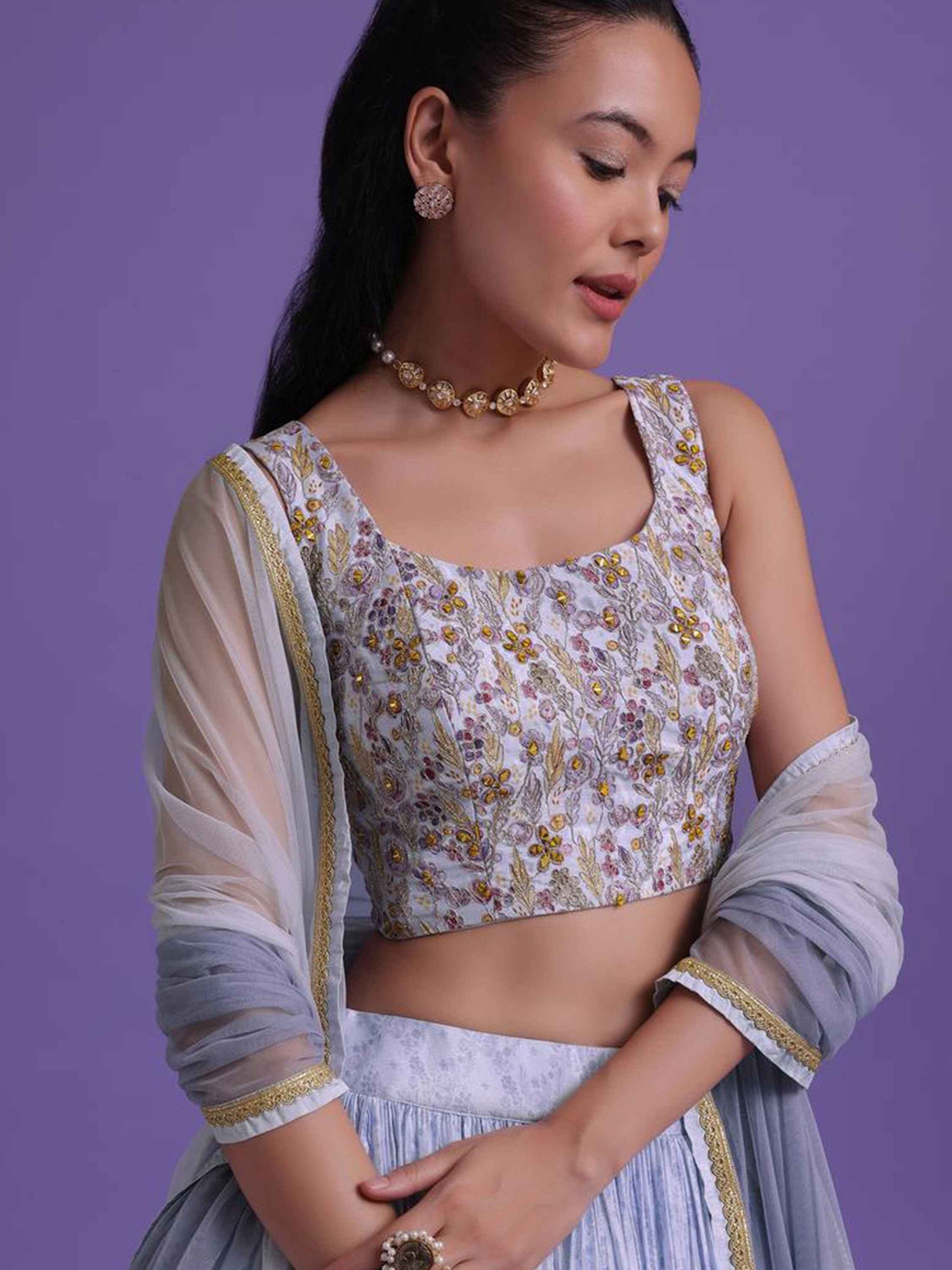 Wonderful Lavender Sequins Net Engagement Wear Lehenga Choli